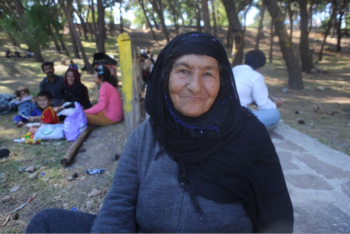 October 4,2015-Lesvos, North-east Aegean sea, Greece: Refugees arrive by a small plastic and cheap boat to the coasts of the Greek island Lesvos from the Turkish land (Maro Kouri)