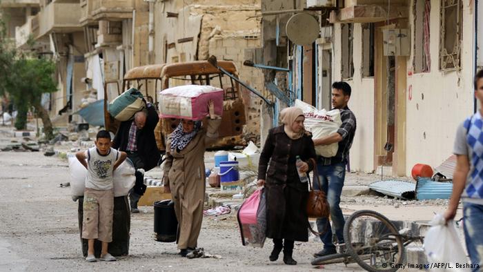 Após a retomada do controle em Palmira, população começa a retornar a suas casas
