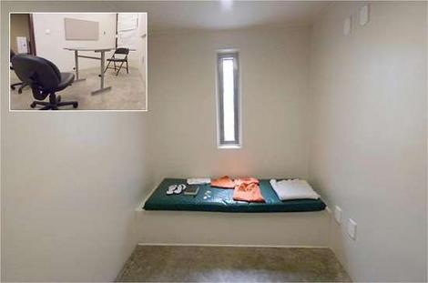 David Hicks's cell in Guantanamo, and the book-free "library".