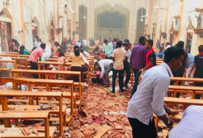 More than 200 killed and at least 500 injured as eight explosions rocked Catholic churches and luxury hotels in Sri Lanka while Christians began Easter Sunday celebrations.