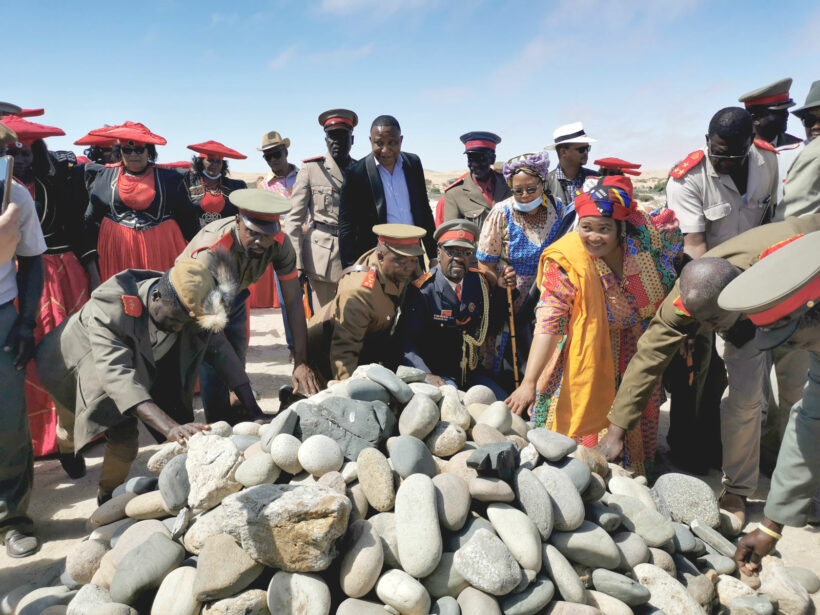 Descendants of the victims of the genocides paying their respect at the monument for the Nama genocide grave. 