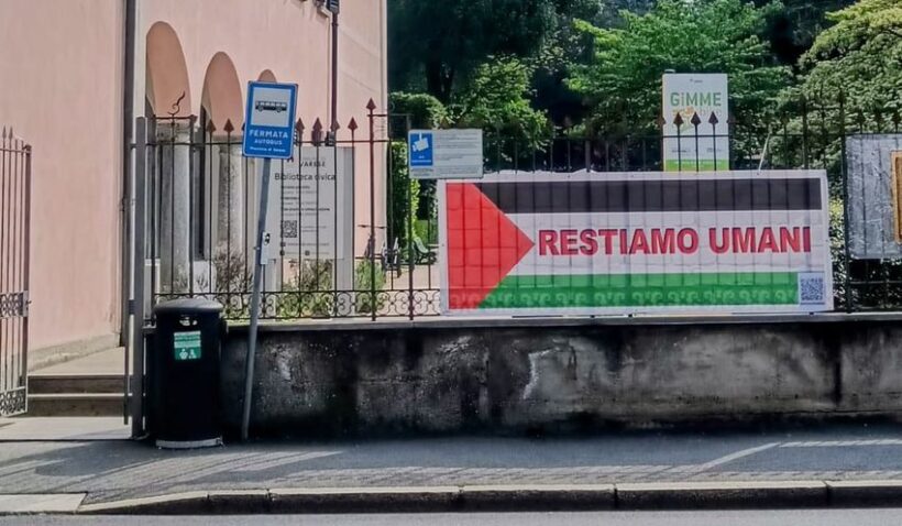 striscione con la frase restiamo umani di Vittorio Arrigoni