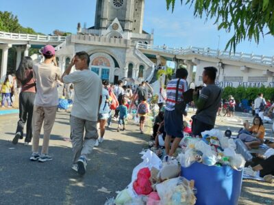 A garbage bin overflows with mixed trash thrown by visitors of the popular Grotto of the Our Lady of Lourdes in Bulacan.
