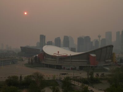 Downtown Calgary, Alberta, Canada draped in wildfire smoke.17 May 2023.* Author: Dwayne Reilander. Wikimedia Commons.