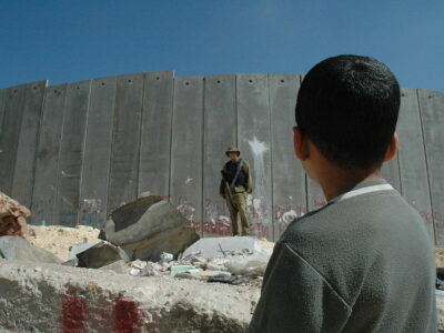 1024px-Boy_and_soldier_in_front_of_Israeli_wall