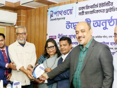 Dhaka Reporters Unity President Abu Saleh Akon and General Secretary Mynul Hasan Sohel are presenting crests of honor to the guests at the event.
