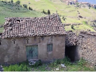 An old Kabyle house in ruins stands abandoned in the middle of the village.