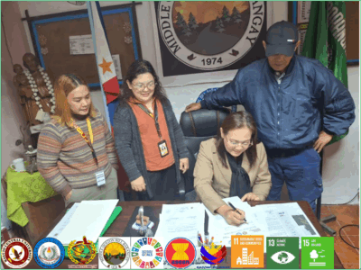 November 15, 2025. Institutionalizing Stewardship for a Sustainable Eco Zone: Dr. Genevieve B. Kupang, Dean of the BCU Graduate School, formalizes the Memorandum of Agreement (MOA) for Project Green Guardians with Hon. Potenciano L. Martinez, Punong Barangay of Middle Quezon Hill. Witnessing this milestone are Dr. Jennifer T. Longchasen (CES Coordinator) and Josefa P. Dampilag (Doctoral Student Representative). Photo credit: Joy Belle M. Bidang (PHAS student).