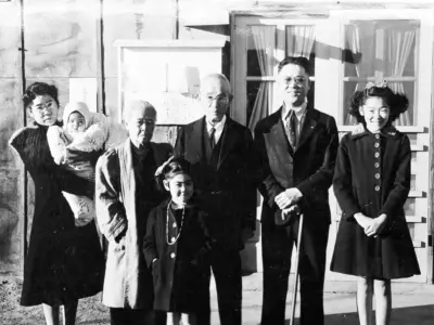 Shown here are members of the author’s family in front of the barracks at the Minidoka incarceration camp. His mother, Marie Sakamoto Ishii, is at far right; she is standing next to her father, James Sakamoto; the author’s grandmother Misao Sakamoto is holding Marie’s sister Justine Denise; and standing at center is Marie’s sister Marcia. Also shown are his great-grandparents Osamu and Tsuchi Sakamoto. (Courtesy of Mike Ishii)