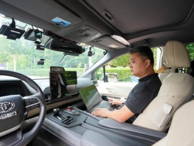 (240709) -- BEIJING, July 9, 2024 (Xinhua) -- Wang Wei conducts road testing for an autonomous vehicle at an autonomous driving demonstration area in Yizhuang in Beijing, capital of China, June 19, 2024.
  Wang Wei joined Pony.ai, a Chinese autonomous driving solution provider in 2019 and now works as a safety supervisor of autonomous vehicles. He is responsible for maintaining devices that support driverless operations, and modifying hardware and software of self-driving cars.
  China's autonomous driving sector is ramping up with a robust expansion of road testing sweeping the country.
  This new phase sees the technology threading through the vibrant streets of populous metropolises, navigating the challenging topography of mountainous regions and making inroads into sectors such as agriculture and retail.
  Against this backdrop, the 39-year-old has more expectations for the future. "It feels like my job has more development potentials, and I hope to become a test engineer for autonomous vehicles in the future," Wang said. (Xinhua/Ju Huanzong)