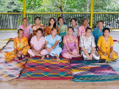 Sama-Bajau weavers sitting on their traditional tepo creations Photo by Jay Bautista.