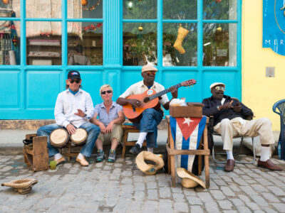 Senior cuban men playing traditional music in the streets of Old Havana