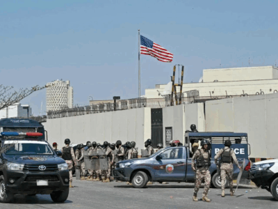 Pak Security personnel stand guard outside the US consulate in Karachi on March 1, 2026.