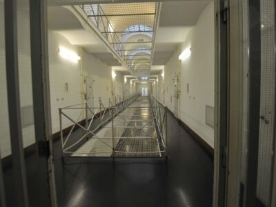 the empty corridor of a prison