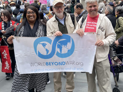 Rally on the steps of the New York Public Library before marching to the United Nations.